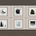 Black And White Abstract Artworks Framed On Wall With Wooden Floor