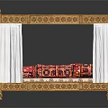 Ornate Golden Carved Double Bed With White Canopy And Colorful Patterned Cushions