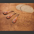 Roasted Chicken Drumsticks on Wooden Cutting Board with Bread Slices and Black Peppercorns