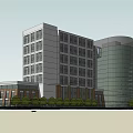 Modern Multi Storey Hotel Building With Circular Structure Waterfront Landscaping And Parking Area