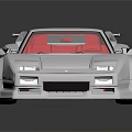 Silver Classic Sports Car With Red Interior And Rear Spoiler Design