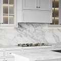 Elegant Modern Kitchen Interior With Marble Countertops White Cabinets And Island