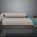 Modern Pink Sofa With Wooden Frame Rolled Cushion And Blue Throw Blanket