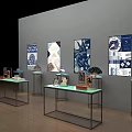 Modern Display Shelves With Glass Countertops Displaying Decorative Items And Blue White Paintings