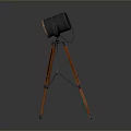 Vintage Tripod Spotlight With Wooden Legs And Illuminated Metal Head