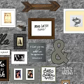 Decorative Photo Wall with Framed Art Inspirational Quotes Ampersand Symbol Bench and Gray Wall