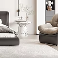 Modern Bedroom Interior Design With Black Bed Round Wall Art Area Rug And Accent Chair