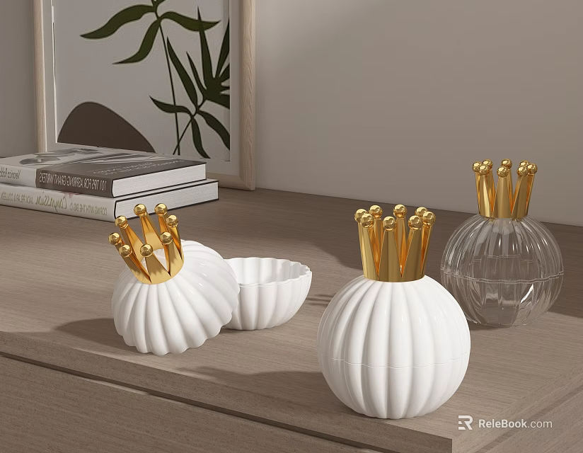 White Ceramic Vessels with Golden Crown Decorations and Round Pumpkin Shaped Design on Wooden Tabletop 3d model 