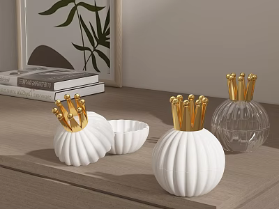 White Ceramic Vessels with Golden Crown Decorations and Round Pumpkin Shaped Design on Wooden Tabletop 3d model