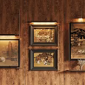 Artistic Wooden Wall Display With Framed Paintings Hanging Lamps And Small Shelf Plant