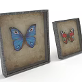 Two Vintage Framed Butterfly Artworks With Blue And Red Designs On Beige Background