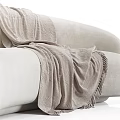 Modern Cream Sectional Sofa With Soft Textured Fabric Curved Design Throw Blanket And Accent Pillows