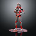 Armored Character In Red Gray Armor Holding Weapon Standing On Detailed Base