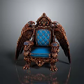 Ornate Winged Chair Design With Blue Tufted Cushion And Intricate Carvings