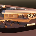 Modern BMW Building Exterior With Glass Facade And Outdoor Seating Area