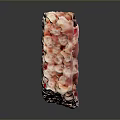 Rice Crispy Treat with Orange and Pink Sprinkles on Black Surface with Reflection