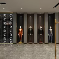 Modern Clothing Store Front With Window Mannequins And Decorative Lattice Sign
