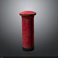 Vintage Red Postbox With Classic Cylindrical Structure And Smooth Surface