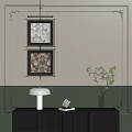 Stylish Interior Decor With Framed Artworks White Table Lamp And Green Plant