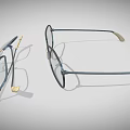 Two Pairs of Stylish Eyeglasses With Metal Frames And Transparent Lenses