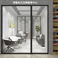 Modern Legal Office Interior With Glass Door Office Desks Chairs Sofa And Green Plant