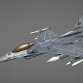 Military Fighter Jet With Gray Camouflage Paint Golden Nose Cone Mounted Missiles And Wing Markings