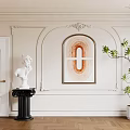 White Decorative Background Wall with Ornate Moldings Arch Framed Artwork Statue Plant and Wooden Floor