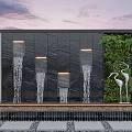 Garden Feature With Black Wall Waterfalls Greenery Wall And White Crane Sculptures Under Sunset Sky