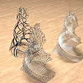Decorative Ornament Set With Metallic Intricate Latticework And Twisted Spiral Design On Wooden Floor