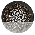 Circular Metal Wall Hanging With Brown Silver Curved Pieces And Spiral Pattern On Black Background