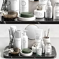 Stylish Bathroom Accessories With Folded Towels Aromatic Bottles And Green Plant On Shelves