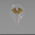 Transparent Glass Bulb Container Holding Two Golden Bells With Bottom Ring Hook On Dark Background