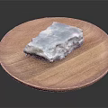 Blue And White Food Item On Round Wooden Plate With Smooth Surface