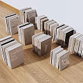 Stacked Books And Magazines On Wooden Floor With Various Cover Designs