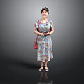 Casual Woman Standing In Floral Dress With Hat Red Bag And Sandals
