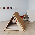 Triangular Pet Beds With Wooden And White Design And Colorful Balls For Pets