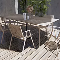 Modern Outdoor Dining Table And Chairs Set With Umbrella On Wooden Deck And Plants