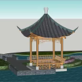 Traditional Chinese Pavilion With Tiled Roof On Water Surrounded By Natural Landscape