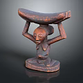 Decorative Pillow Featuring Wooden Sculpture Design Seated Figure Holding Banana Shaped Object