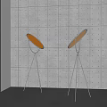 Modern Floor Lamps With Tripod Base And Round Shade Against Perforated Wall
