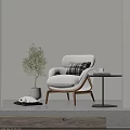 Comfortable White Lounge Chair With Plaid Cushion Wooden Legs Side Table Coffee Cup And Plant