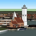 Waterfront Scene With Red Roofed Buildings Sailboat Yacht And Moored Boats At Dock