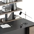 Modern Black Office Desk With Laptop Open Book Desk Lamp And Bookshelf With Books Folders