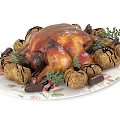 Glazed Roasted Chicken with Herb Potatoes and Fresh Garnish on Floral Plate