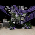Elegant Floral Display with Purple Curtains Hanging Silver Spheres and Event Decor Setup