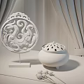 Elegant Decorative Ornament Set with Green Hollow out Ornament Brown Incense Burner and Curtain Background
