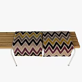 Outdoor Table with Wooden Top White Metal Legs and Zigzag Patterned Blanket Brown Beige Purple