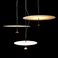 Three Modern Pendant Lights With Circular White Shades And Warm Illumination