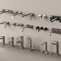 Various Modern Faucet Designs Displayed on Wall and Shelf in Showroom