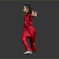 Young Woman Practicing Martial Arts In Red Uniform With Yellow Patterns